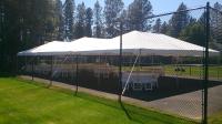 Tent set up on tennis court if it can be done our crew can do it!